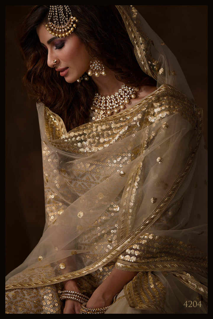 Reception Wear Dusky Beige Net Designer Sharara Suit - Fashion Nation