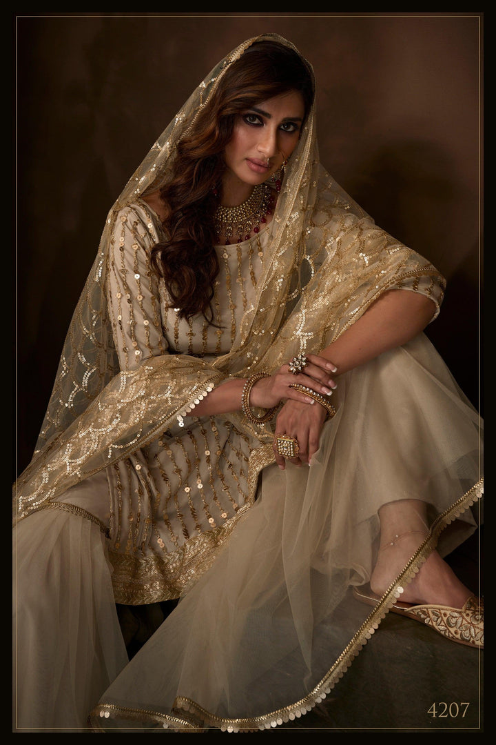 Sangeet Special Beige Golden Net Attractive Sharara Suit - Fashion Nation